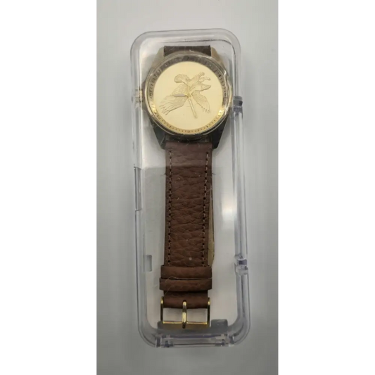 Watch with brown leather strap and gold face