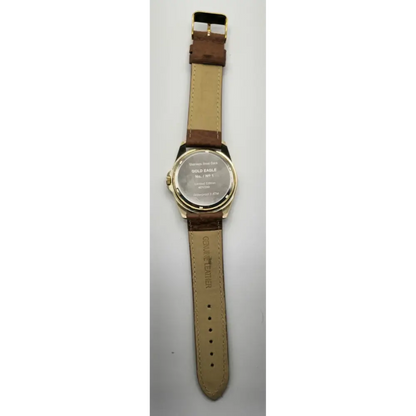 Watch with brown leather strap on a white background