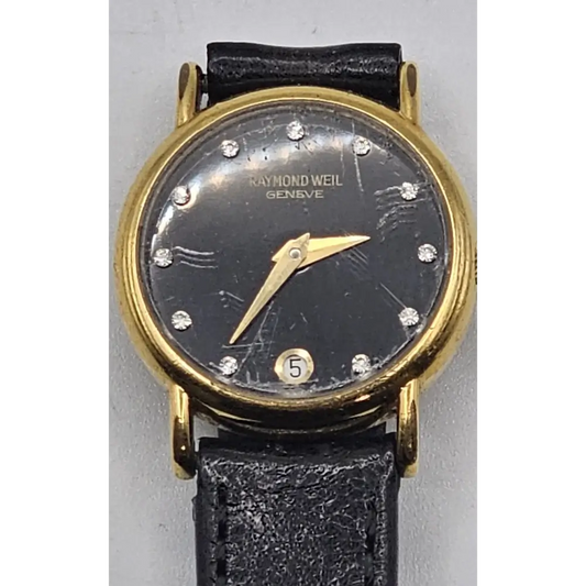 Vintage Raymond Weil watch with black face and gold accents
