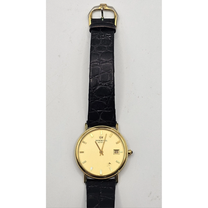 Gold wristwatch with black leather strap 