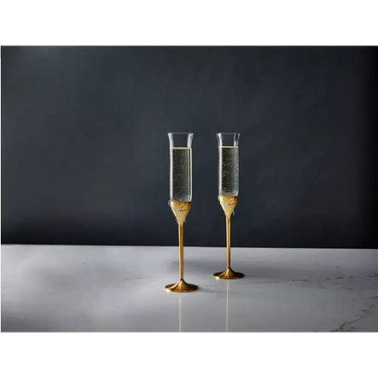 Two gold champagne flutes