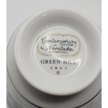 Close-up of a white ceramic bowl with 'Contemporary Fine China by Noritake Philippines' label.