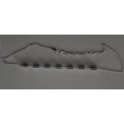 Silver chain on a gray background