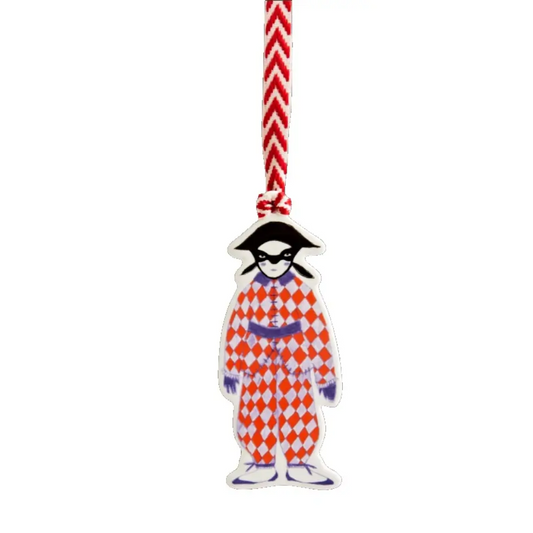 Decorative tag with a character in a red and white checkered outfi