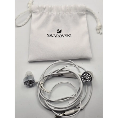 Swarovski branded earphones with a white drawstring pouch