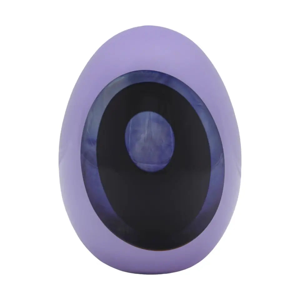A purple silicone eye-shaped squishy toy with a glossy black pupil and a blue iris, isolated on a white background from our Crystal Glassware collection 