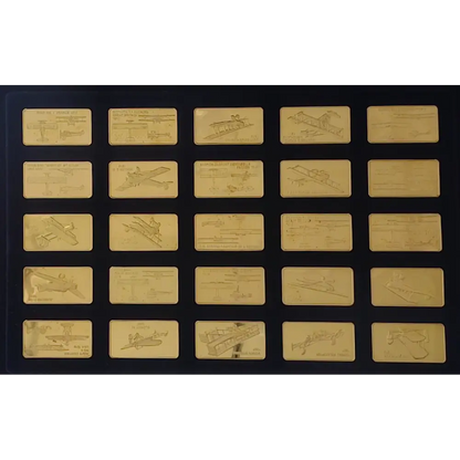 Collection of gold airplane models on a black background