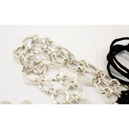 Silver chain necklace on a white background
