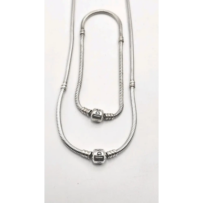 Two silver snake chain necklaces 