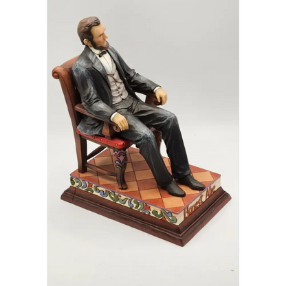 Statue of a man in formal attire