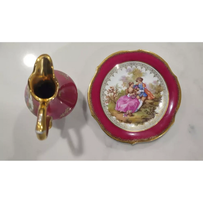 Decorative ceramic pitcher and saucer with floral