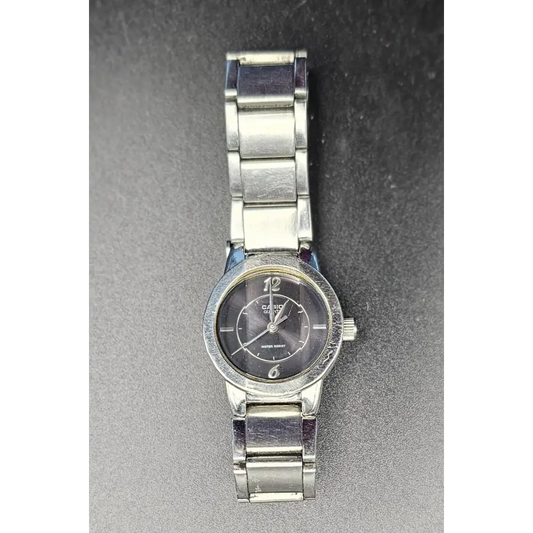Silver watch with a black face