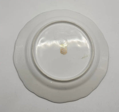 White ceramic plate with a visible brand logo