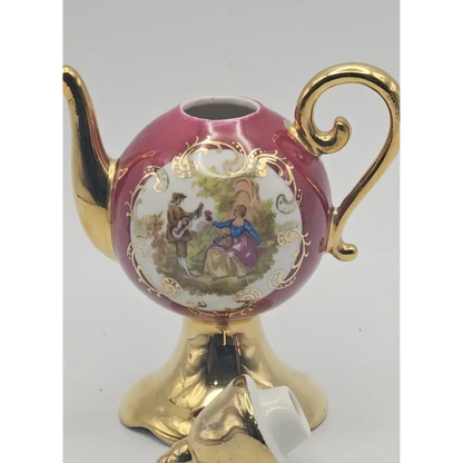 Decorative teapot with gold accents