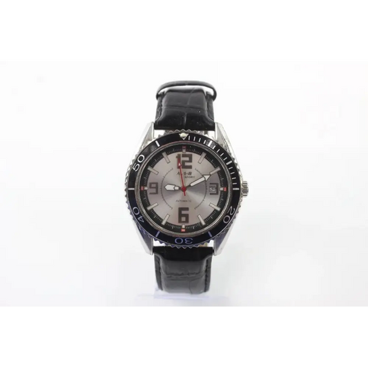 Wristwatch with black leather strap and silver case