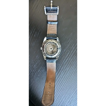 Watch with a brown leather strap
