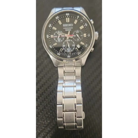 Seiko watch with a silver band 