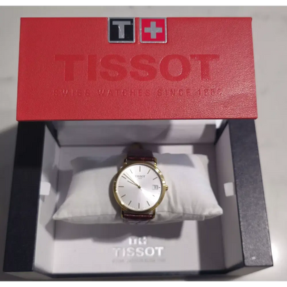 Tissot watch in a red Tissot box 
