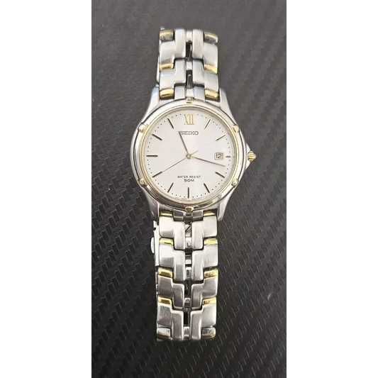 Silver and gold Seiko watch 