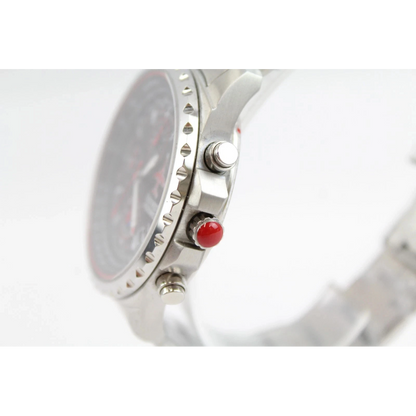 Close-up of a watch with a red accent