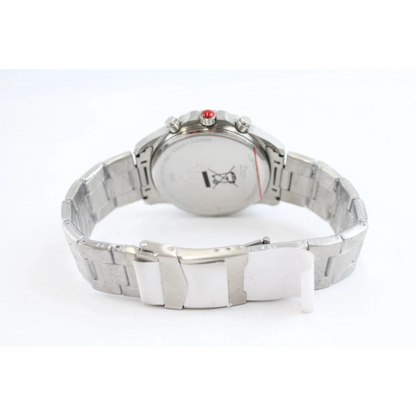 Silver watch on a white cushion