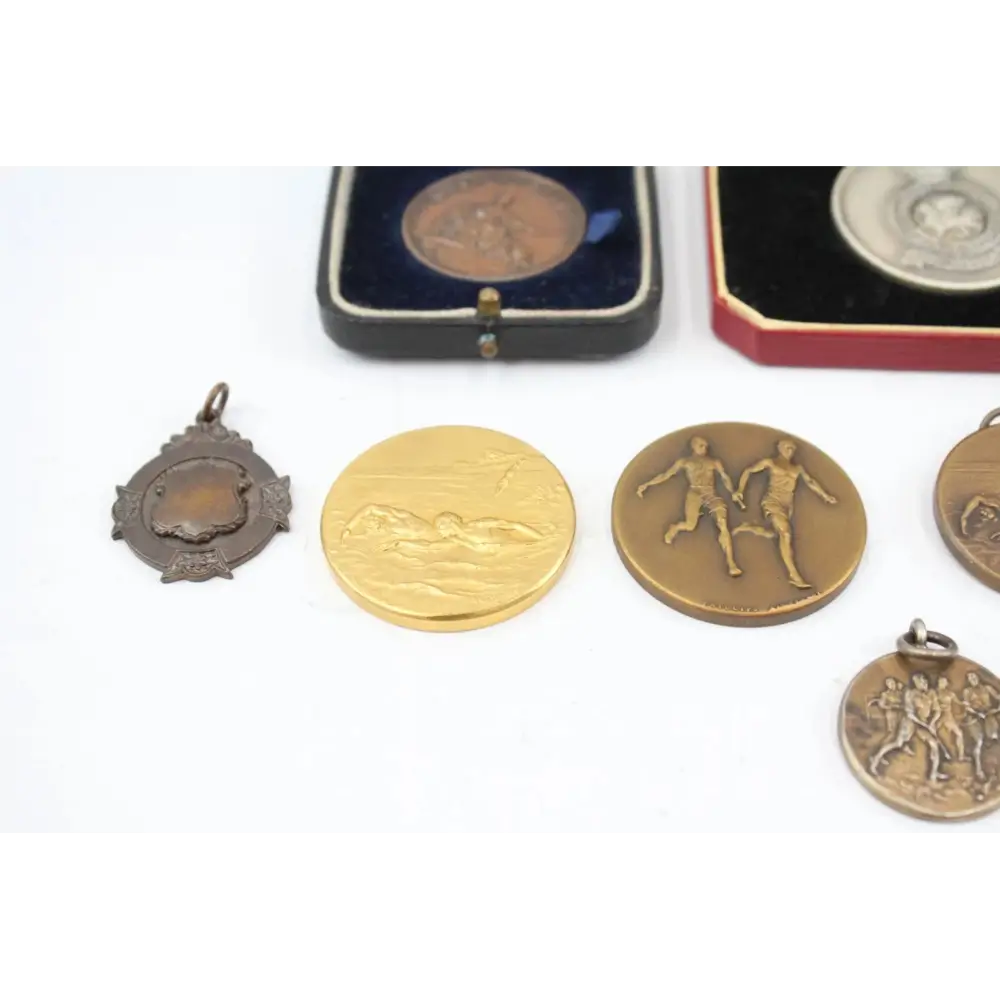 Collector’s display of 12 Military Sports Medals & Medallions