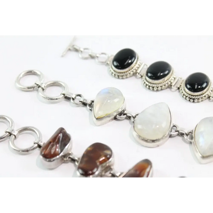 Bracelet with heart-shaped gemstones on a white background