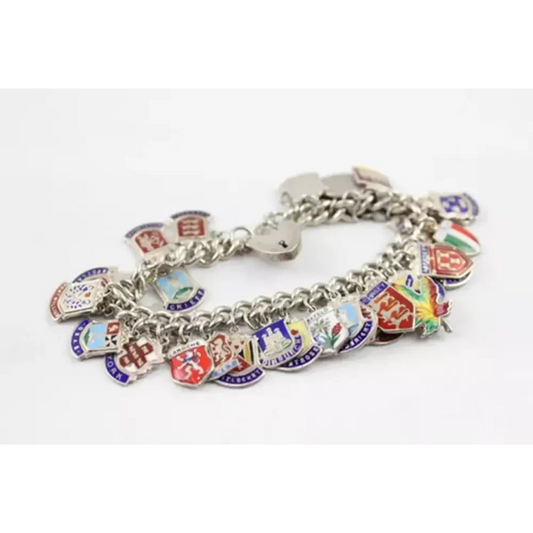 Silver bracelet with various charms