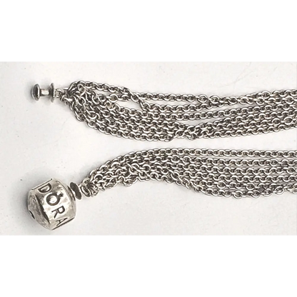 Silver chain necklace with a 'Dora' pendant 