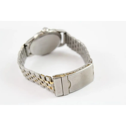 Metallic watch band on a white background