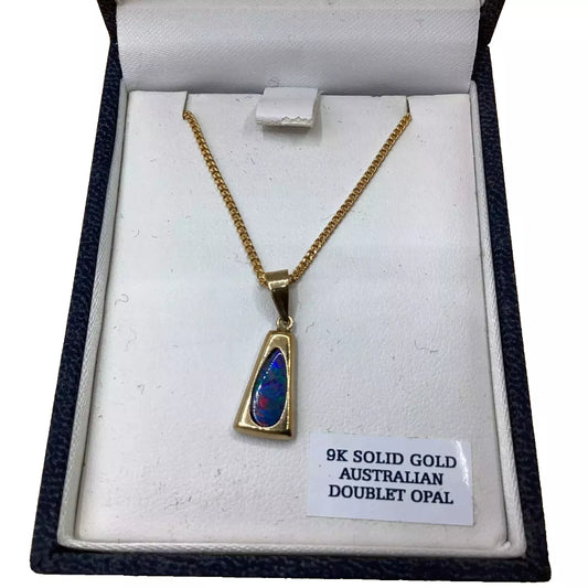Gold necklace with a pendant labeled '9k Solid Gold Australian 