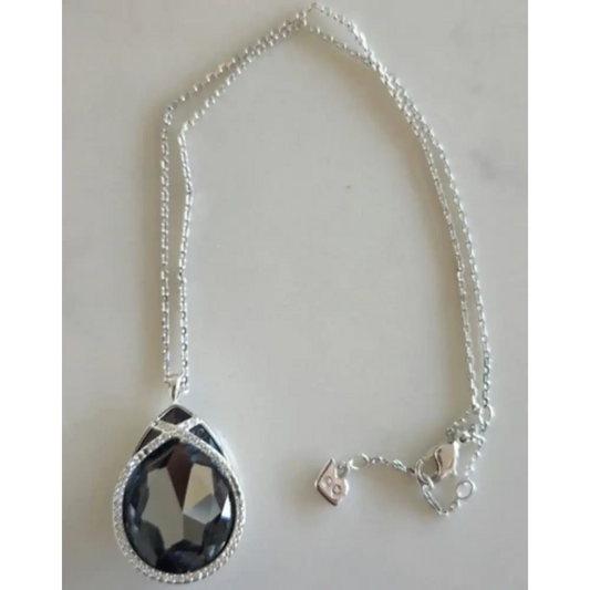 Necklace with a black teardrop pendant
