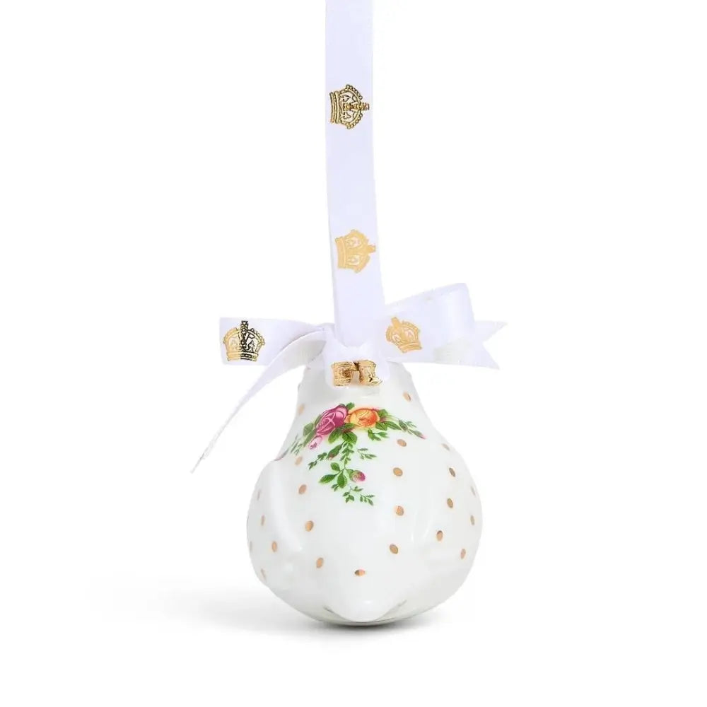 Decorative ornament with floral design and gold polka dots 