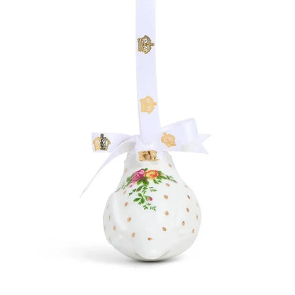 Decorative ornament with floral design and gold polka dots 
