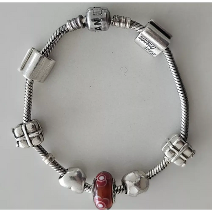 Silver bracelet with various beads