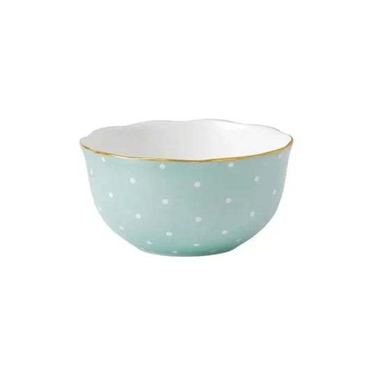 Light blue ceramic bowl with white polka dots