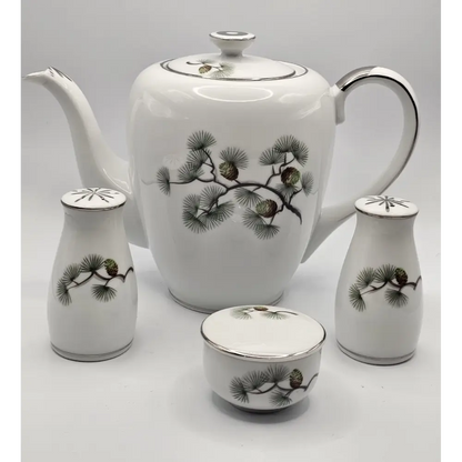 Ohno Kutani hand-painted Japanese porcelain set arranged for display