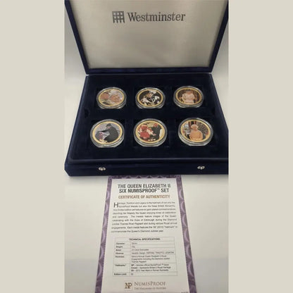 Set of six numismatic coins in a Westminster box with a certificate of authenticity on a white background.