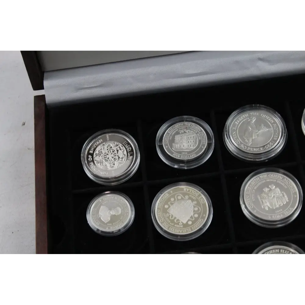 Set of six silver coins in a display case