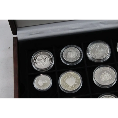 Set of six silver coins in a display case