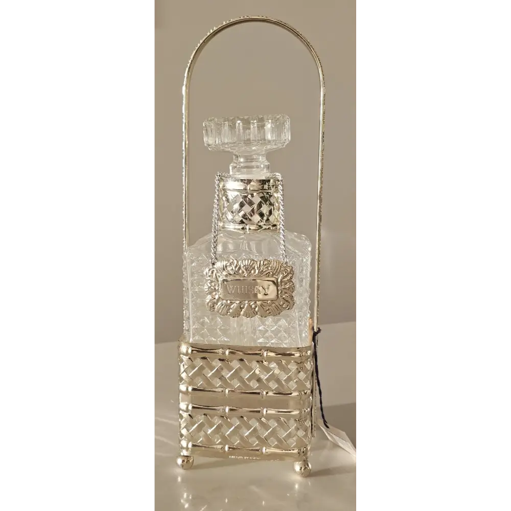 Queen Victoria silver plated whisky decanter housed in a decorative woven Tantalus cradle from our Home Decor collection