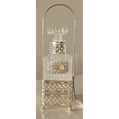 Queen Victoria silver plated whisky decanter housed in a decorative woven Tantalus cradle from our Home Decor collection