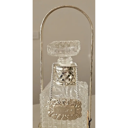 Close-up of the "Made in England" hallmark and silver plating on the Queen Victoria decanter set.