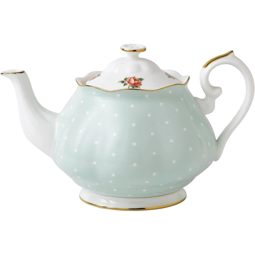 Teapot with polka dot design on a white background