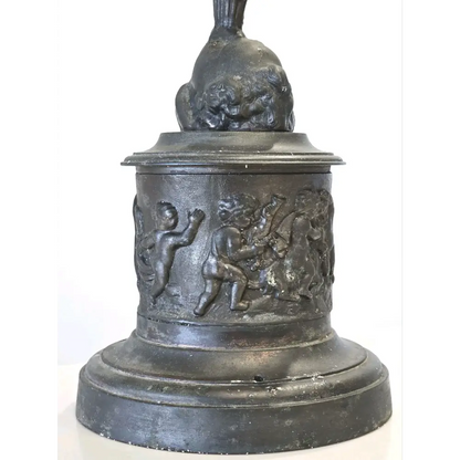 Decorative black urn with relief sculptures