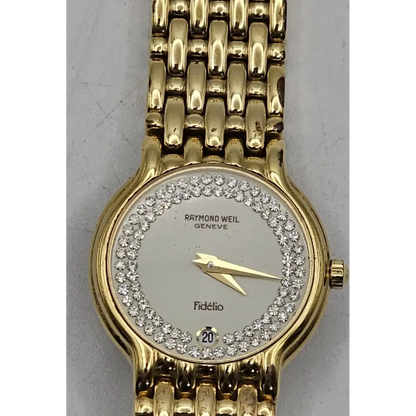 Gold watch with diamond-studded face