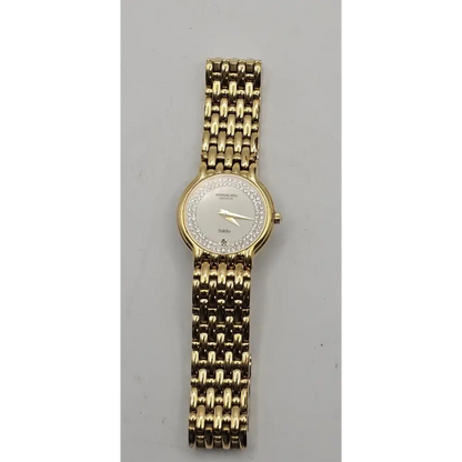 Gold watch with a chain-like band