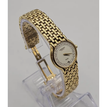 Gold watch with a diamond-studded face 