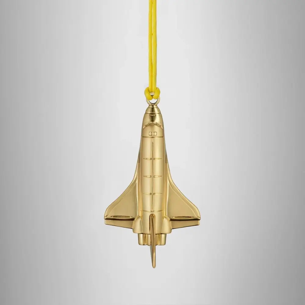 Gold rocket-shaped ornament