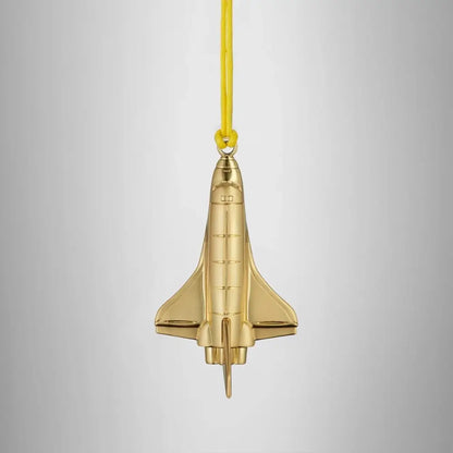 Gold rocket-shaped ornament